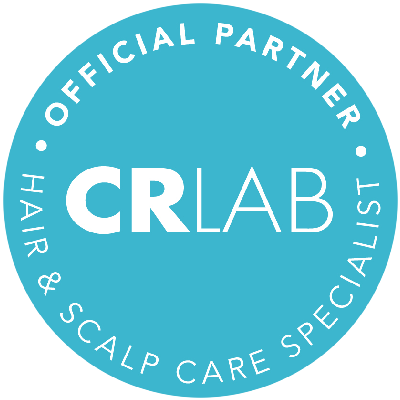 Blue circular badge with white text that reads "Official Partner, Hair & Scalp Care Specialist, CRLAB" in the center, representing trusted Hair Solutions. - Hollywood Hair Salon and Spa in Centralia, IL